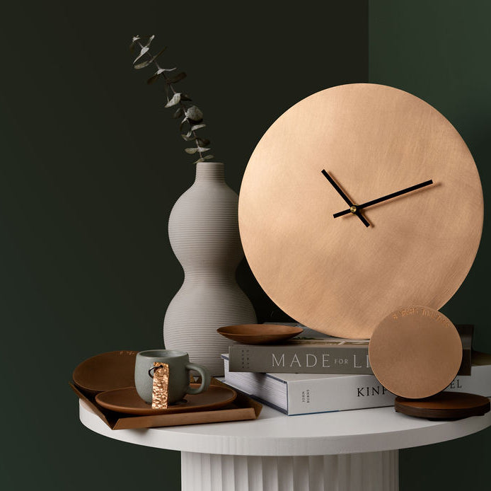 A collection of bronze homewares made by Empire Copper.